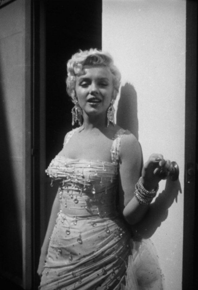 Pictures of Marilyn Monroe During a Cigarette Break While Filming “There’s No Business Like Show Business” (1954) – C1